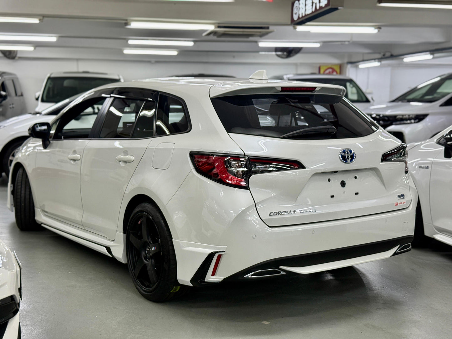 COROLLA TOURING HYBRID WXB (Y'2021 WHITE AT)