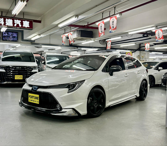 COROLLA TOURING HYBRID WXB (Y'2021 WHITE AT)